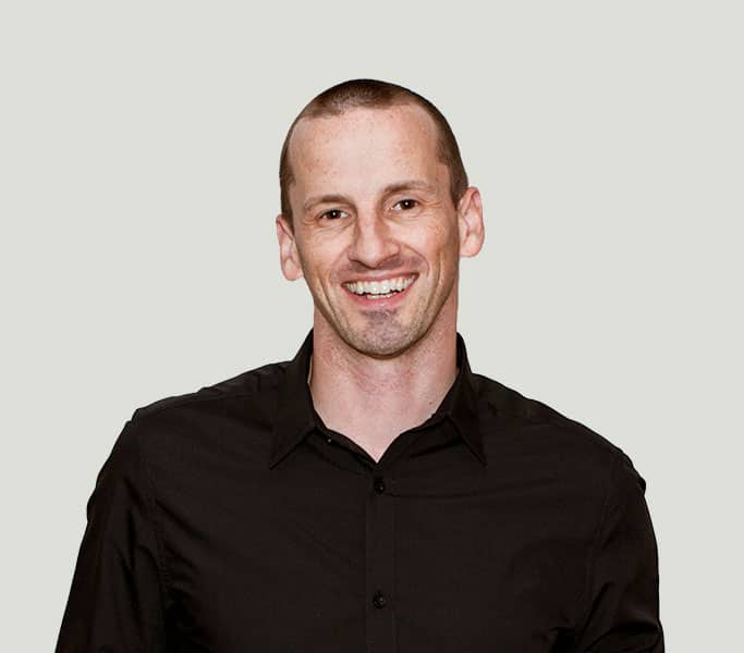 A man wearing a black shirt.